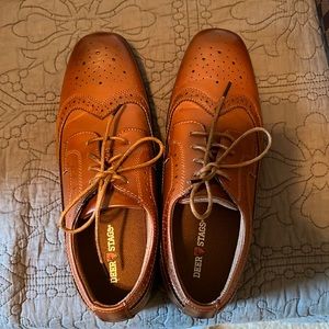Boys dress shoes in brown.